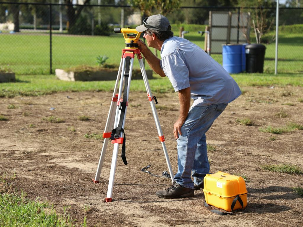 This is Reason Why Classroom Construction Gets Delayed. But Sec. Angara Teamed Up with LRA to Solve It. 5 A land surveyor at work using equipment on a field in Tavares, Florida.