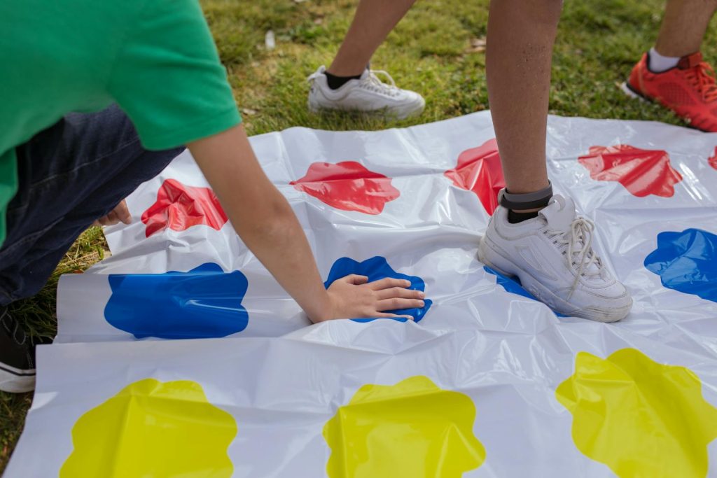 Historical Achievement! Filipino Educator Honored in New York for Remarkable Contribution to Teaching Science and Math 6 Children enjoying a fun game of Twister on a sunny day outdoors.